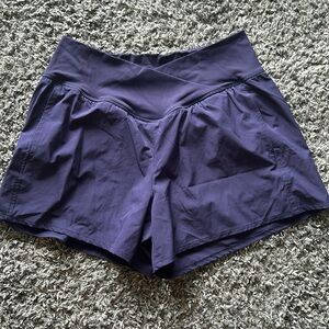 Athletic shorts with liner. Navy/slight purple hue size large never worn